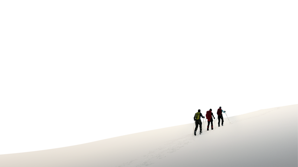 people walking along a hill.